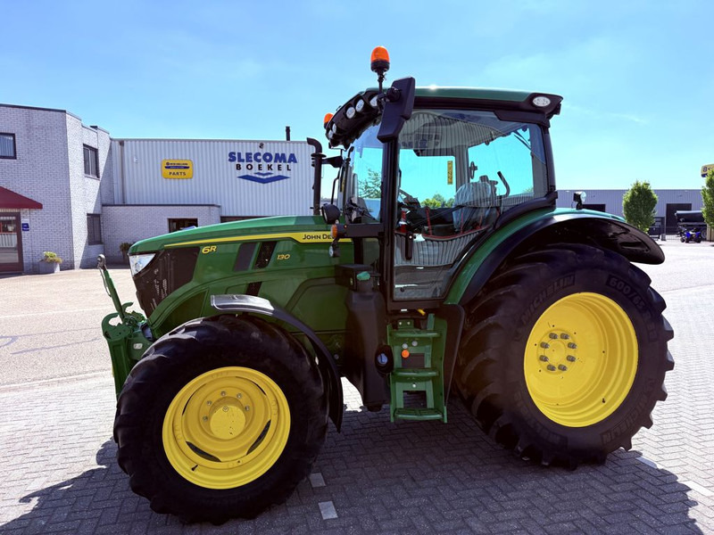 John Deere 6R130 Command Pro Autopowr - Traktors: foto 1 John Deere 6R130 Command Pro Autopowr - Traktors: foto 1
