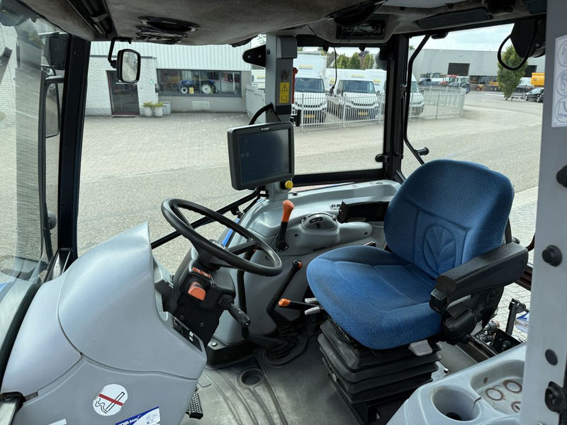 New Holland T5040 CAB + GPS - Traktors: foto 5 New Holland T5040 CAB + GPS - Traktors: foto 5