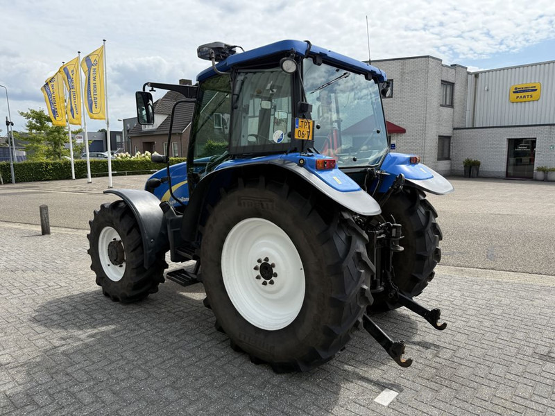 New Holland T5040 CAB + GPS - Traktors: foto 2 New Holland T5040 CAB + GPS - Traktors: foto 2