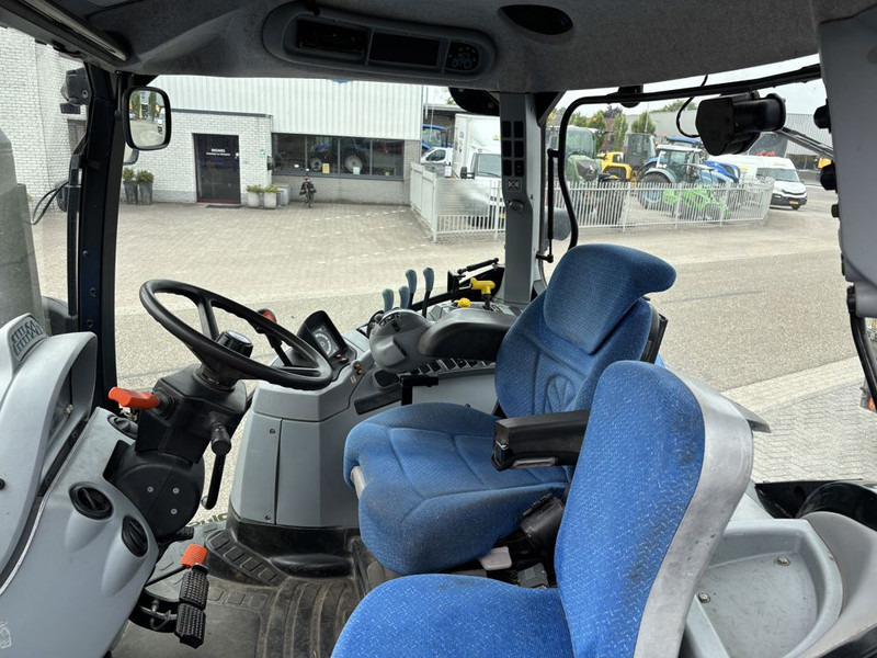 New Holland T6010 Plus Supersteer - Traktors: foto 5 New Holland T6010 Plus Supersteer - Traktors: foto 5