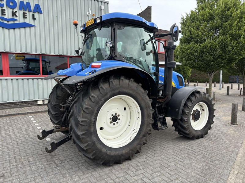 New Holland T6010 Plus Supersteer - Traktors: foto 3 New Holland T6010 Plus Supersteer - Traktors: foto 3