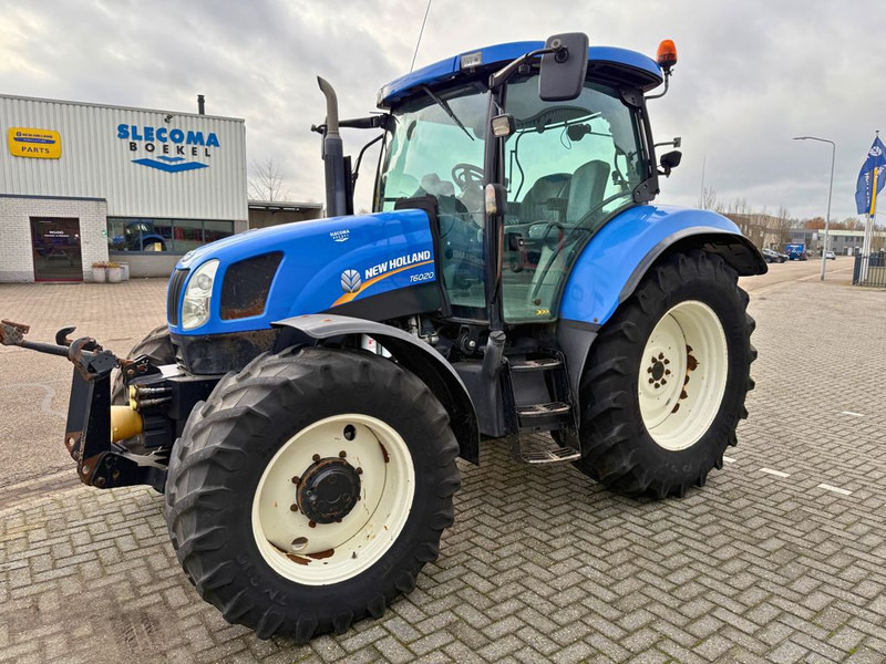 New Holland T6020 Elite - Traktors: foto 1 New Holland T6020 Elite - Traktors: foto 1