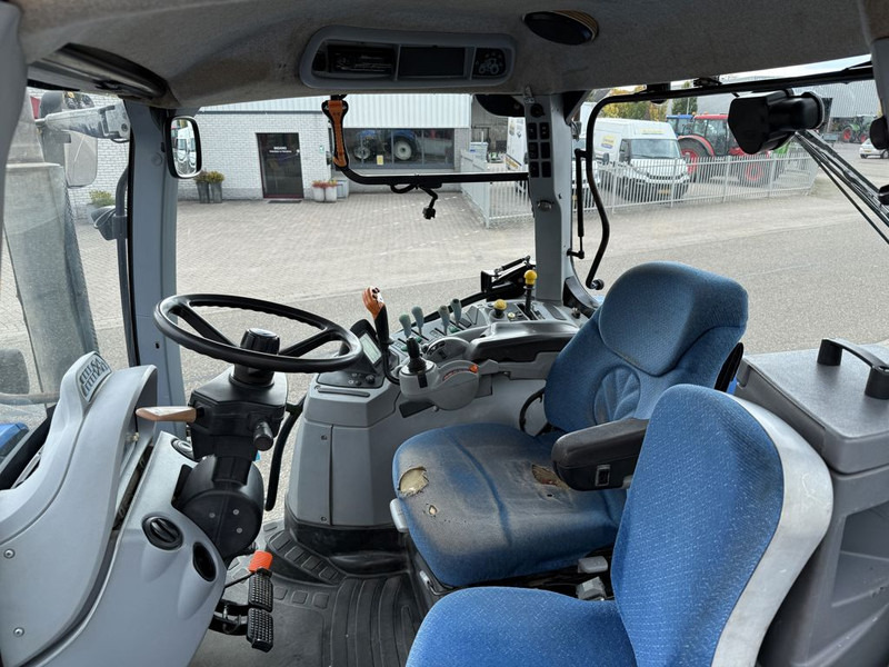 New Holland T7040 Power Command - Traktors: foto 5 New Holland T7040 Power Command - Traktors: foto 5