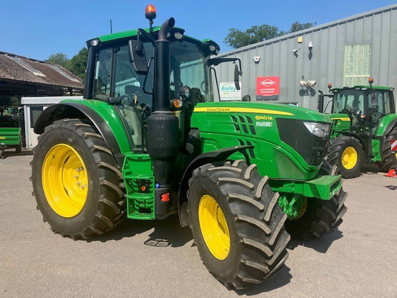 John Deere 6140M - Traktors: foto 1 John Deere 6140M - Traktors: foto 1