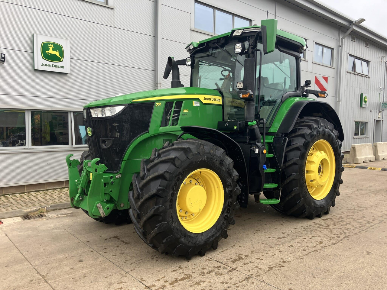 John Deere 7R 310 - Traktors: foto 1 John Deere 7R 310 - Traktors: foto 1
