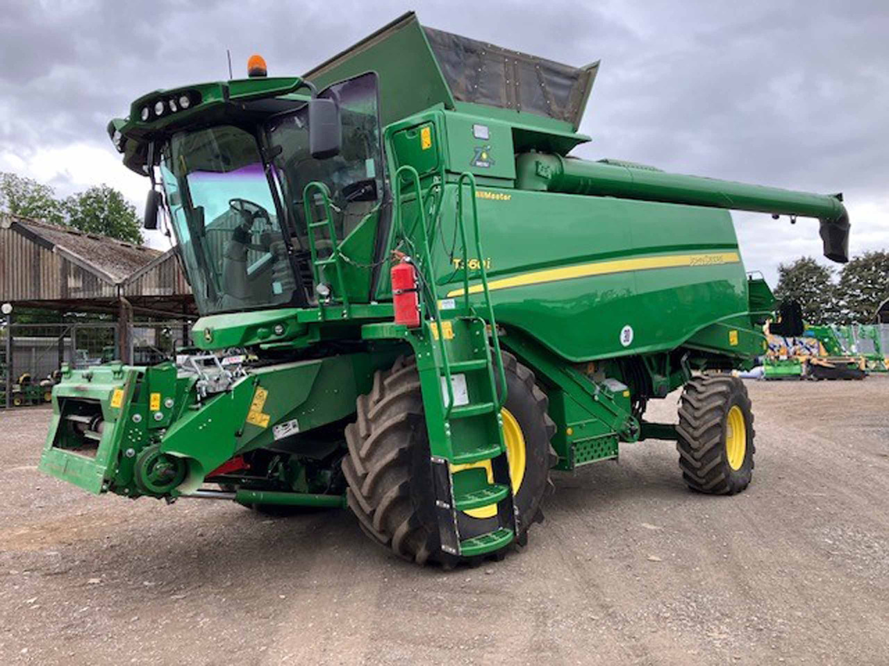 John Deere T560i HillMaster - Labības kombains: foto 1 John Deere T560i HillMaster - Labības kombains: foto 1