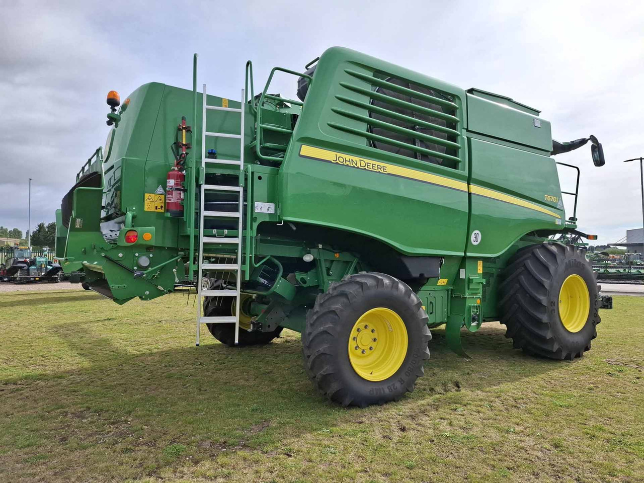 John Deere T670 - Labības kombains: foto 4 John Deere T670 - Labības kombains: foto 4