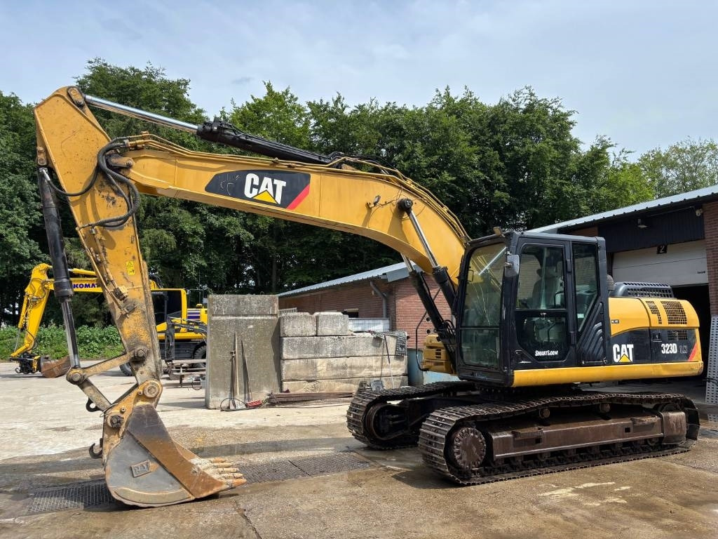 CAT 323 D LN - Kāpurķēžu ekskavators: foto 1 CAT 323 D LN - Kāpurķēžu ekskavators: foto 1