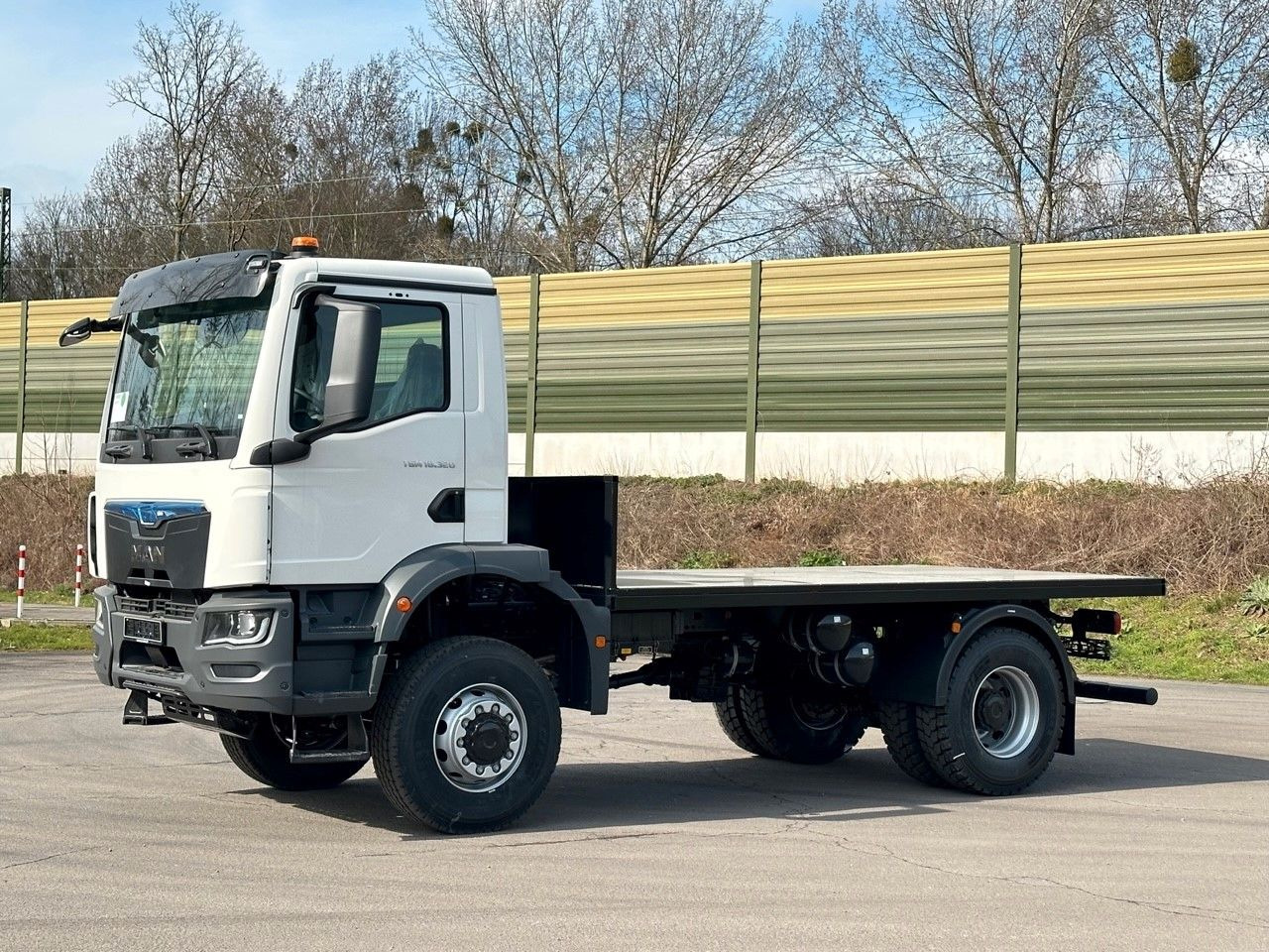 MAN TGM 18.320 4x4 Euro 6e Plato - Bortu kravas automašīna/ Platforma: foto 2 MAN TGM 18.320 4x4 Euro 6e Plato - Bortu kravas automašīna/ Platforma: foto 2
