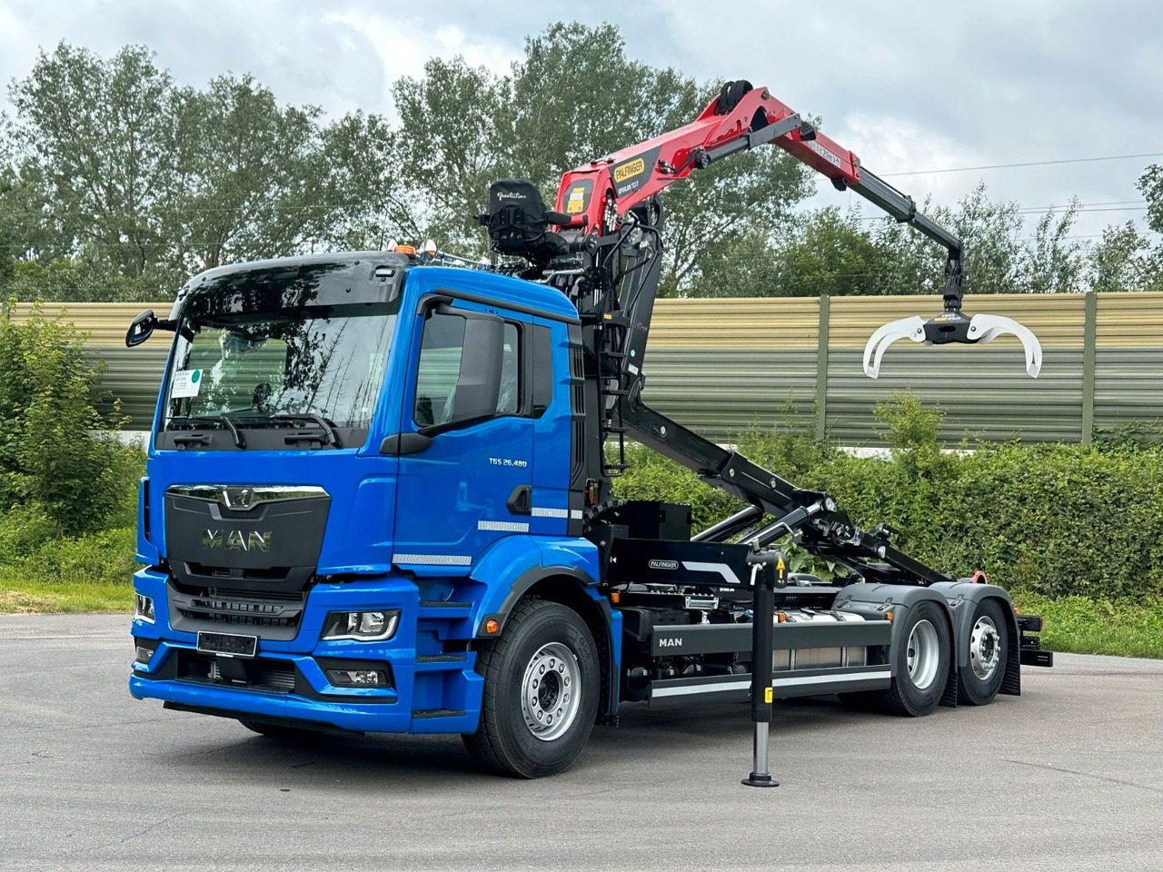 MAN TGS 26.480 6x2 Abrollkipper + Kran EPSILON - Pacēlājs ar āķi, Kravas auto ar manipulatoru: foto 1 MAN TGS 26.480 6x2 Abrollkipper + Kran EPSILON - Pacēlājs ar āķi, Kravas auto ar manipulatoru: foto 1