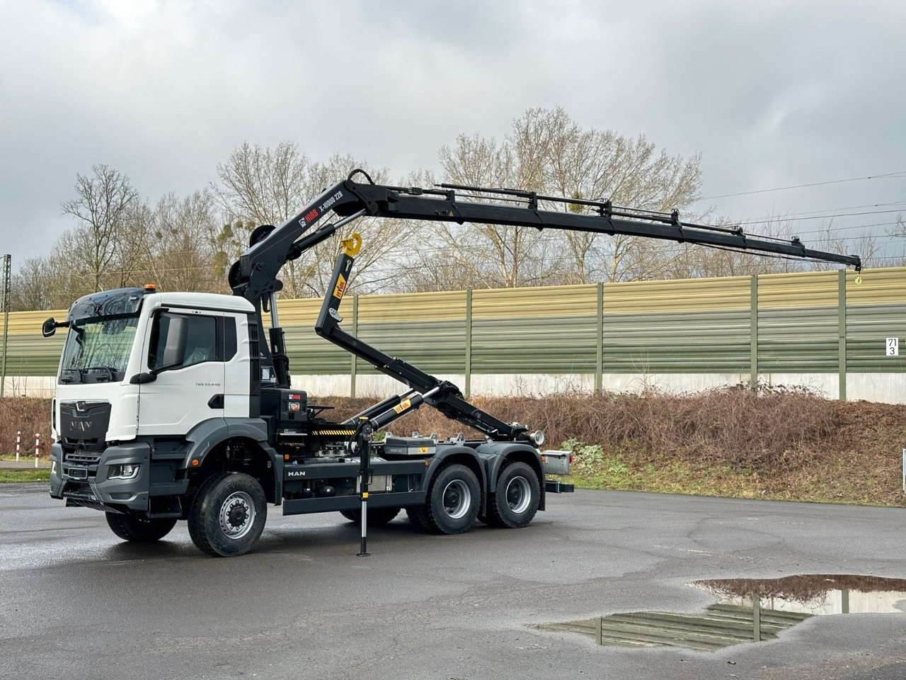 MAN TGS 33.440 6x6 BB Abrollkipper+Kran Hiab 228-6 - Pacēlājs ar āķi, Kravas auto ar manipulatoru: foto 2 MAN TGS 33.440 6x6 BB Abrollkipper+Kran Hiab 228-6 - Pacēlājs ar āķi, Kravas auto ar manipulatoru: foto 2