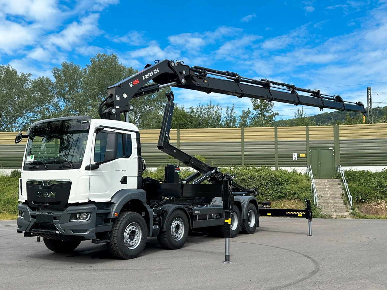 MAN TGS 35.520 8x4 Abrollkipper + Kran HIAB 658E6 - Pacēlājs ar āķi, Kravas auto ar manipulatoru: foto 1 MAN TGS 35.520 8x4 Abrollkipper + Kran HIAB 658E6 - Pacēlājs ar āķi, Kravas auto ar manipulatoru: foto 1
