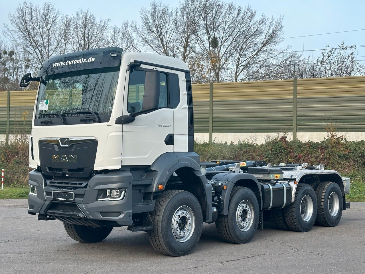 MAN TGS 35.520 8x4 Euro6e Hyva 26-55 Abrollkipper - Pacēlājs ar āķi: foto 2 MAN TGS 35.520 8x4 Euro6e Hyva 26-55 Abrollkipper - Pacēlājs ar āķi: foto 2