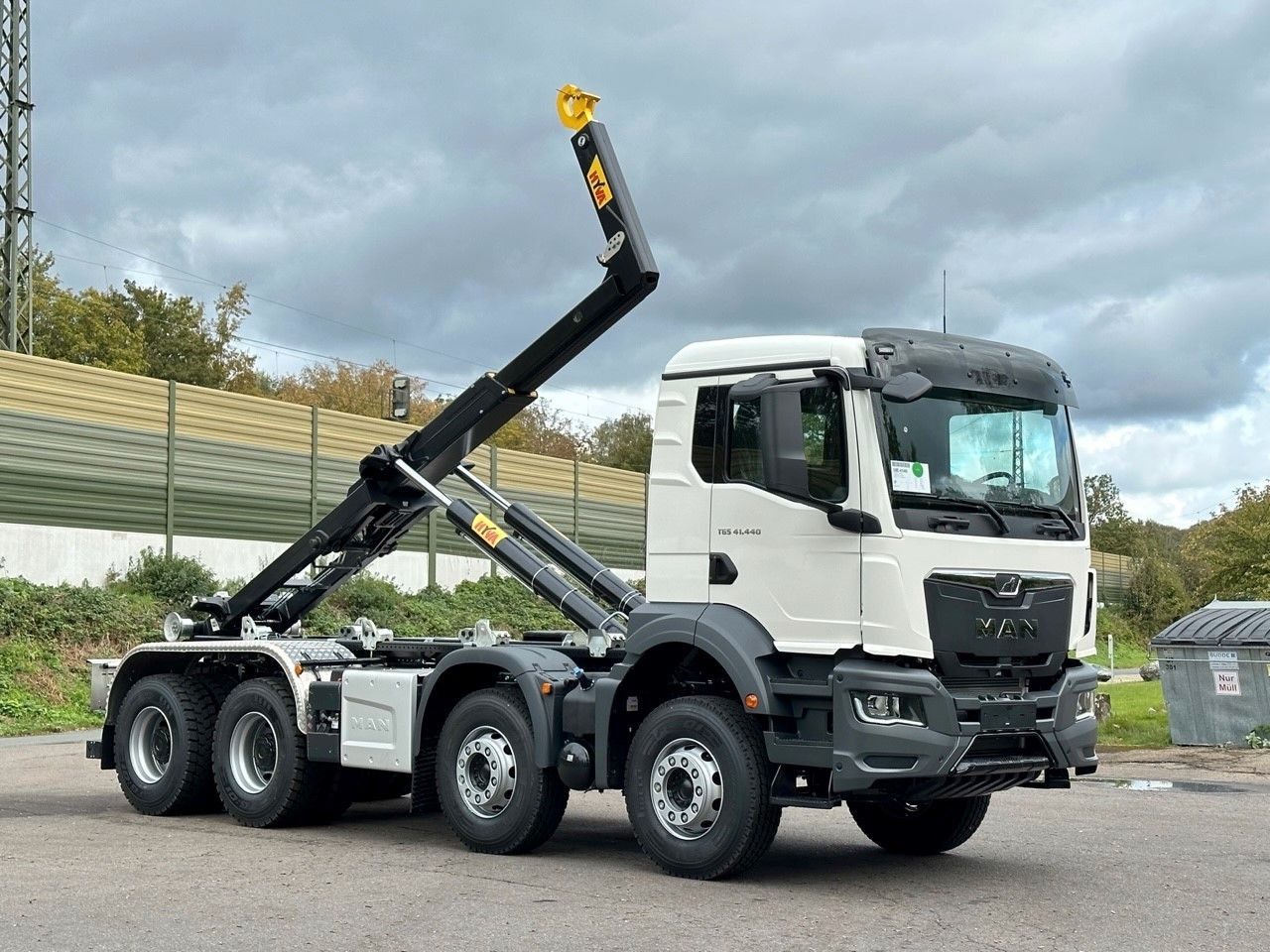 MAN TGS 41.440 8x4 Euro6e Hyva 26-55 Abrollkipper - Pacēlājs ar āķi: foto 1 MAN TGS 41.440 8x4 Euro6e Hyva 26-55 Abrollkipper - Pacēlājs ar āķi: foto 1