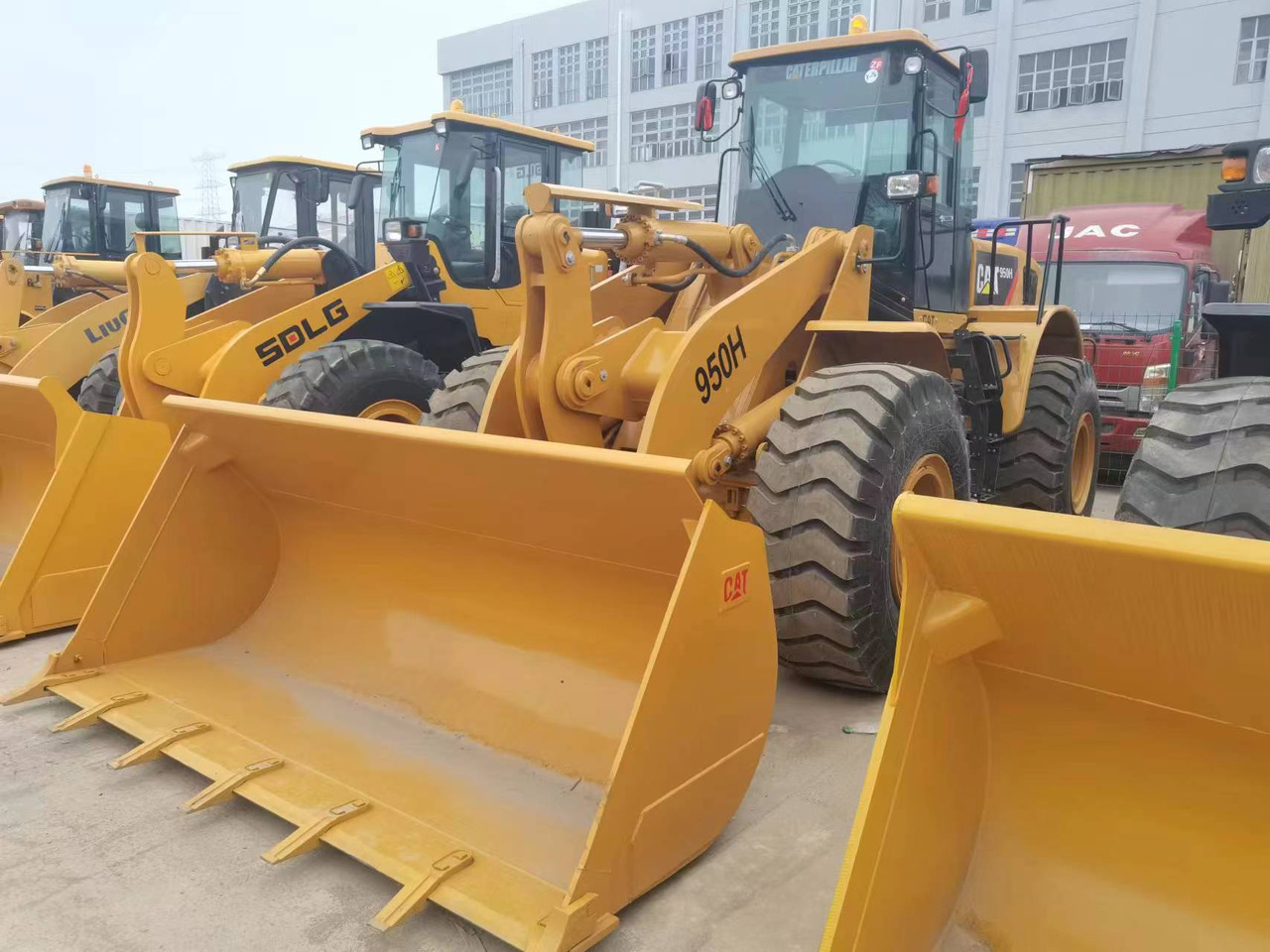 CATERPILLAR 950H - Riteņu iekrāvējs: foto 1 CATERPILLAR 950H - Riteņu iekrāvējs: foto 1