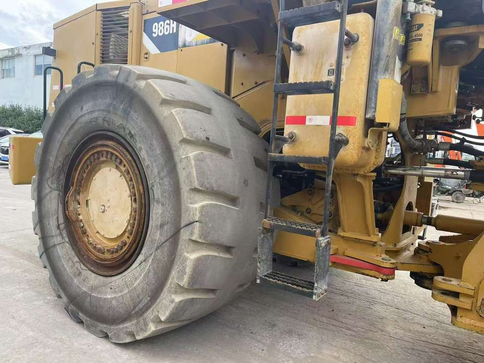 Used Cat Wheel Loader 986H for Sale Caterpillar Wheel Loader 986H in Good Condition - Riteņu iekrāvējs: foto 3 Used Cat Wheel Loader 986H for Sale Caterpillar Wheel Loader 986H in Good Condition - Riteņu iekrāvējs: foto 3