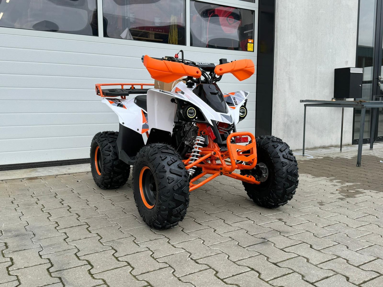 Quad UltraMotocross 125cc (oranje) - Kvadricikls: foto 2 Quad UltraMotocross 125cc (oranje) - Kvadricikls: foto 2