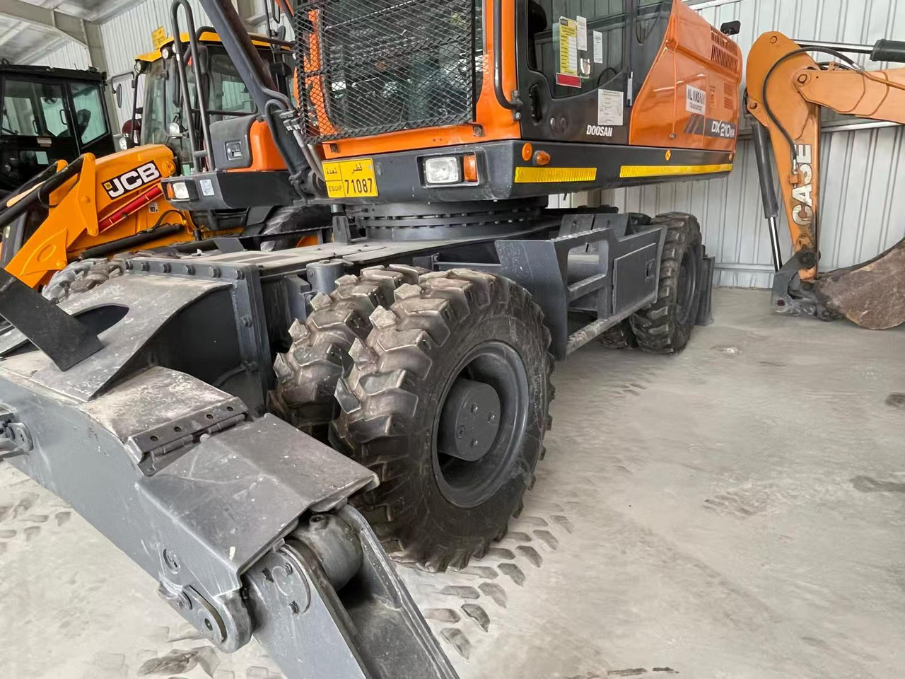DOOSAN DX210 - Riteņu ekskavators: foto 4 DOOSAN DX210 - Riteņu ekskavators: foto 4