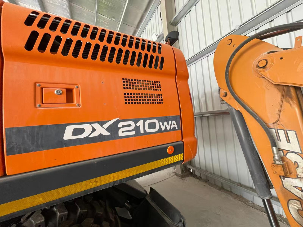 DOOSAN DX210 - Riteņu ekskavators: foto 3 DOOSAN DX210 - Riteņu ekskavators: foto 3