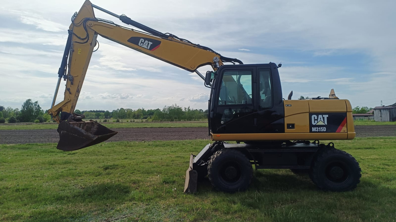 Caterpillar M315D - Kāpurķēžu ekskavators: foto 1 Caterpillar M315D - Kāpurķēžu ekskavators: foto 1