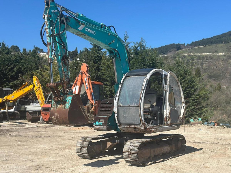 Kobelco SK60 - Ekskavators: foto 1 Kobelco SK60 - Ekskavators: foto 1