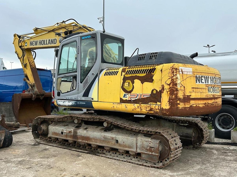 New Holland E215B - Ekskavators: foto 2 New Holland E215B - Ekskavators: foto 2