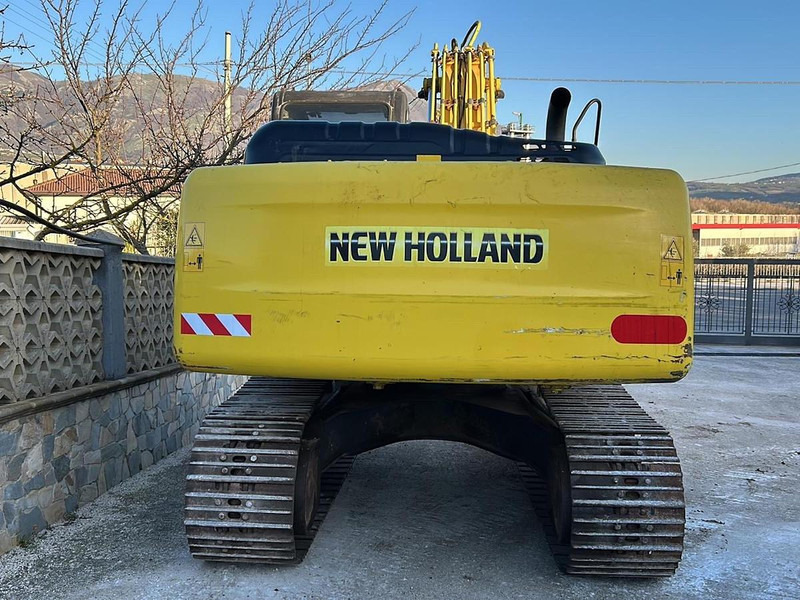 New Holland E245B - Ekskavators: foto 5 New Holland E245B - Ekskavators: foto 5
