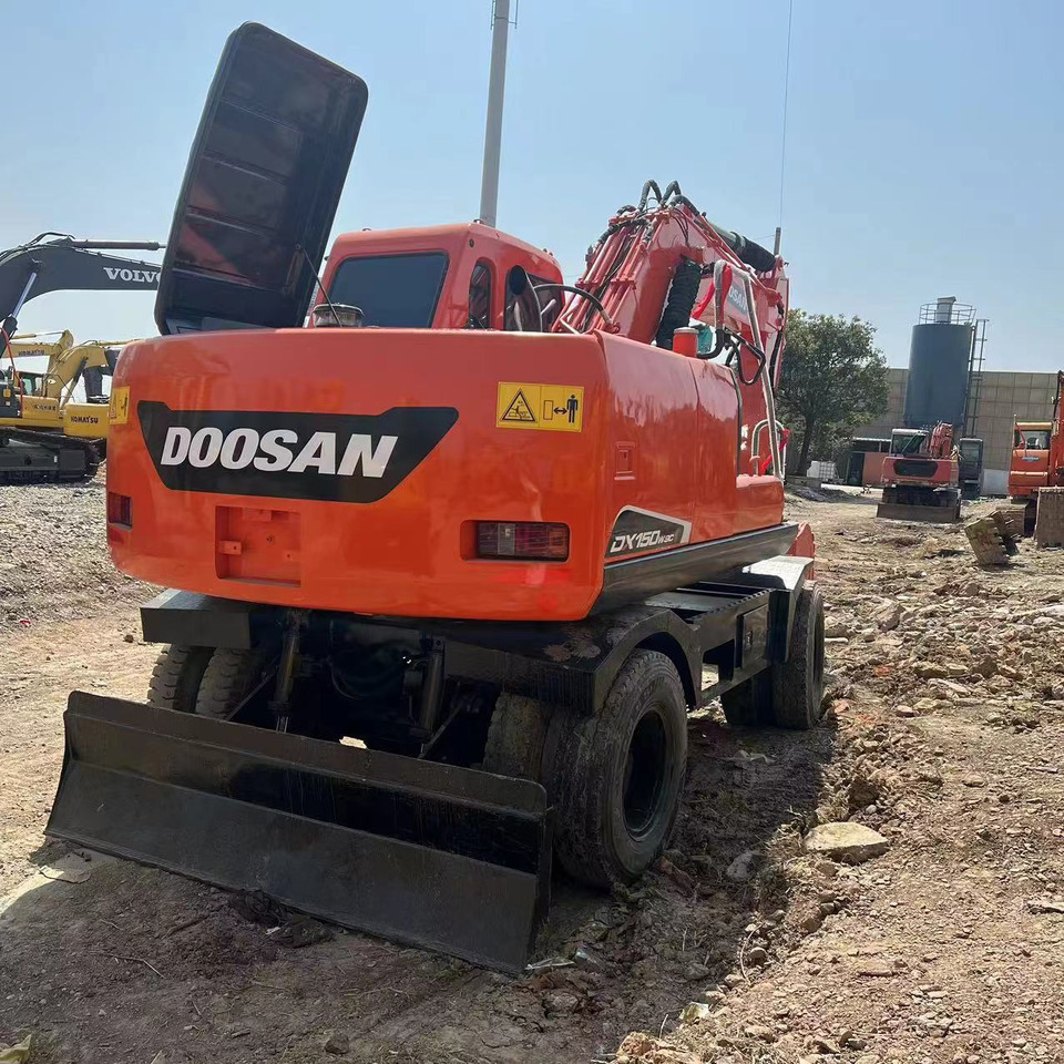 DOOSAN DH150W-7 - Riteņu ekskavators: foto 3 DOOSAN DH150W-7 - Riteņu ekskavators: foto 3