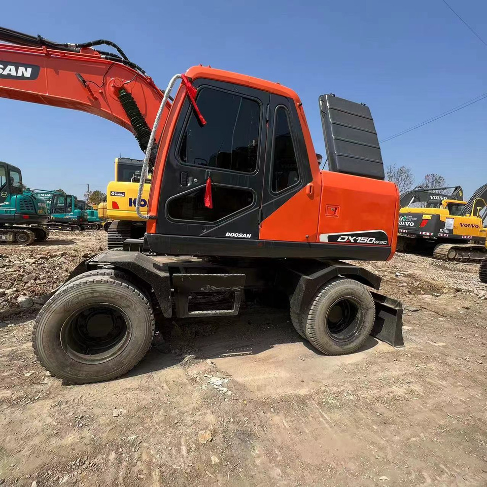 DOOSAN DH150W-7 - Riteņu ekskavators: foto 4 DOOSAN DH150W-7 - Riteņu ekskavators: foto 4