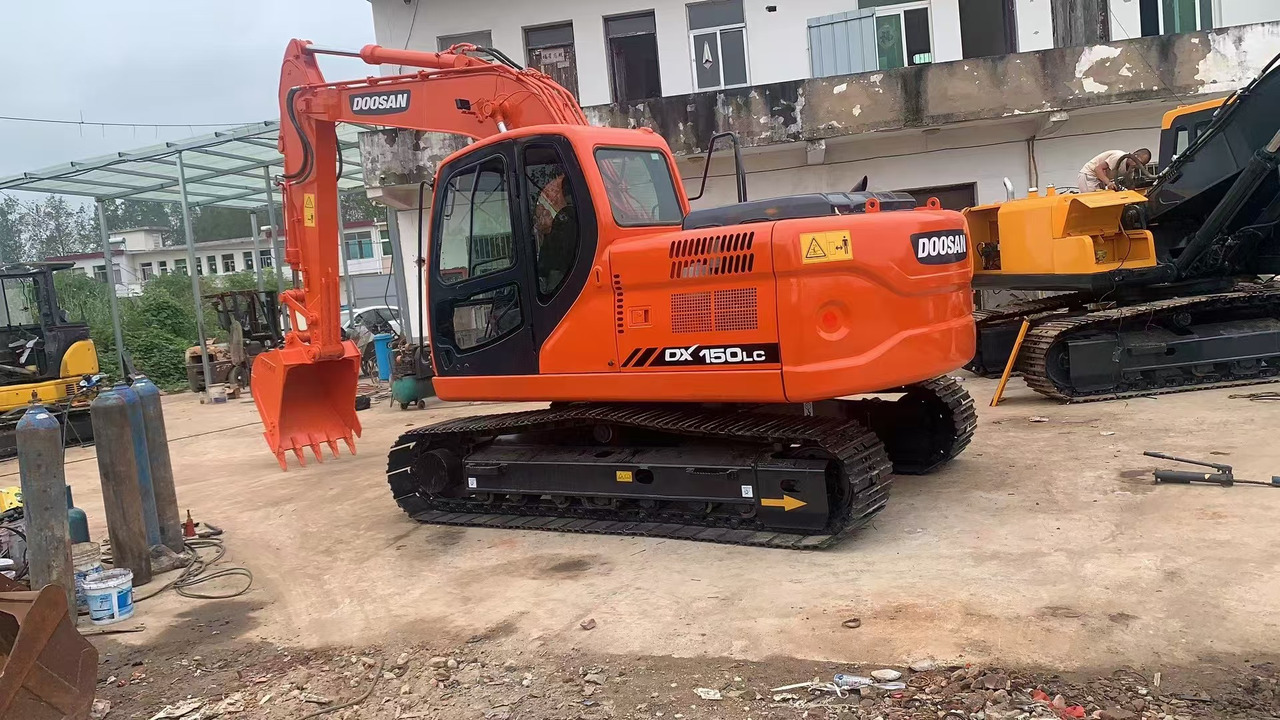 DOOSAN DX150 - Kāpurķēžu ekskavators: foto 1 DOOSAN DX150 - Kāpurķēžu ekskavators: foto 1