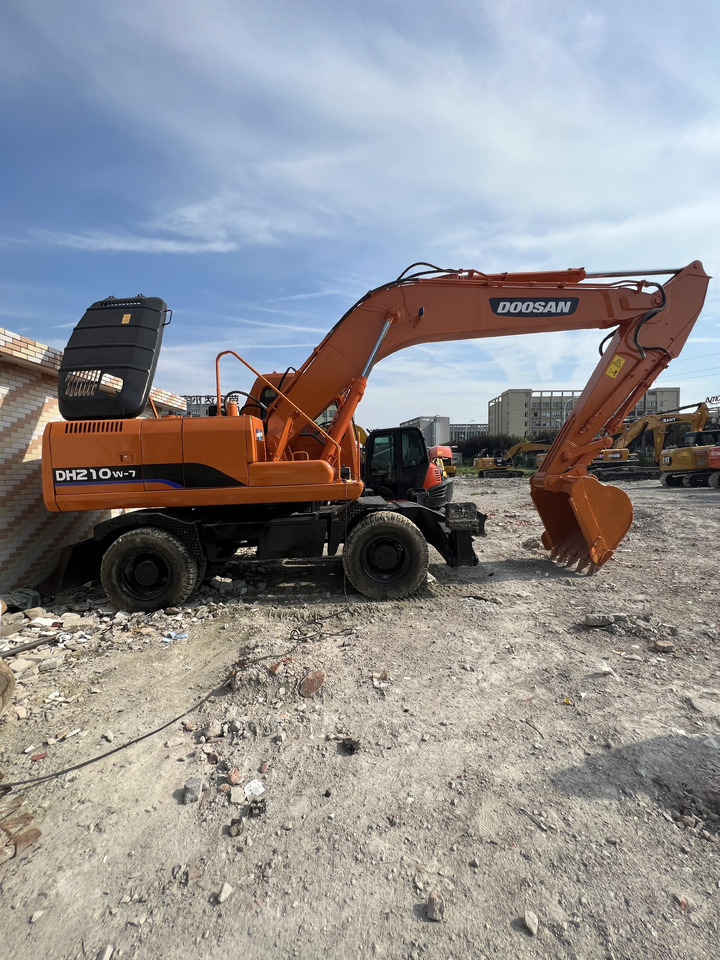 DOOSAN DX210 - Riteņu ekskavators: foto 2 DOOSAN DX210 - Riteņu ekskavators: foto 2