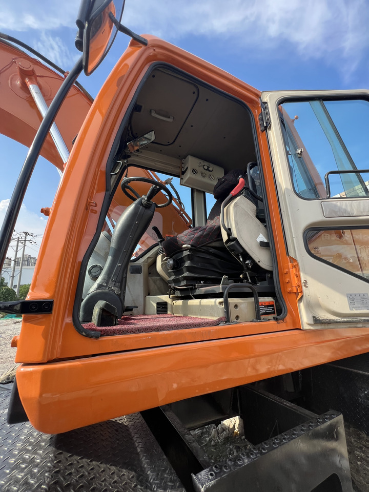 DOOSAN DX210 - Riteņu ekskavators: foto 3 DOOSAN DX210 - Riteņu ekskavators: foto 3