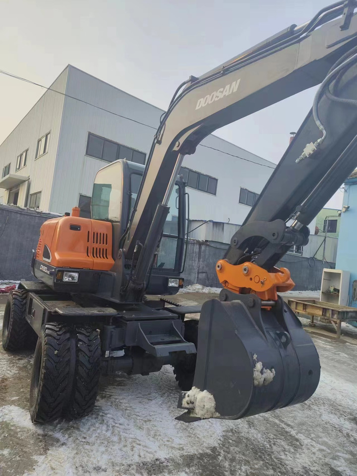 DOOSAN DX60w-9c - Mini-ekskavators: foto 1 DOOSAN DX60w-9c - Mini-ekskavators: foto 1