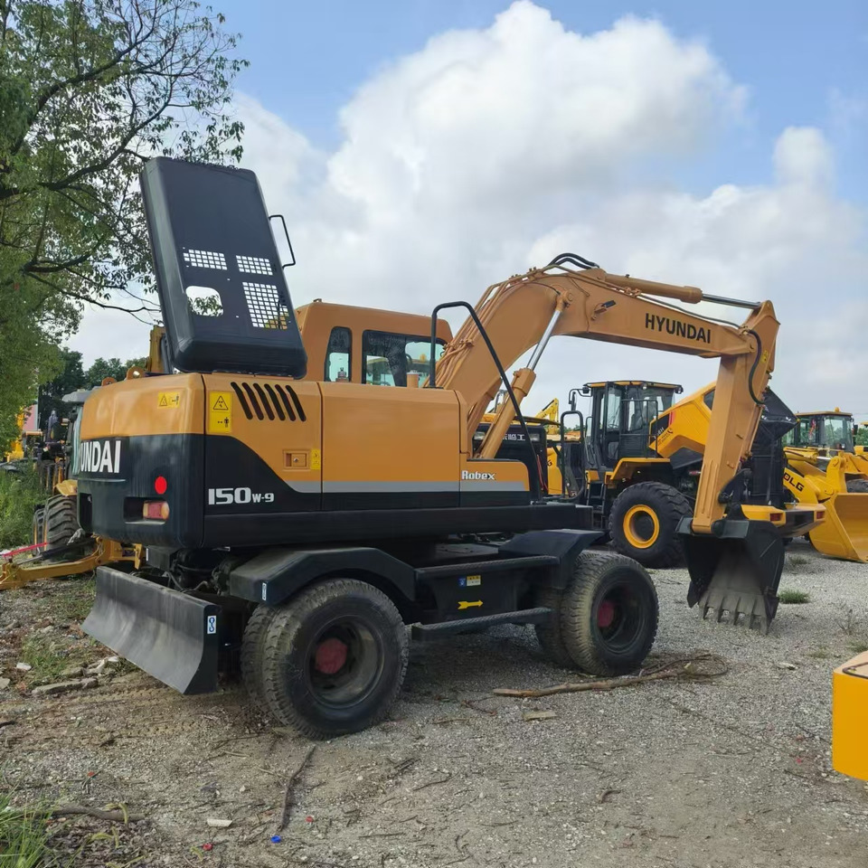 Hyundai R150W-7 - Riteņu ekskavators: foto 5 Hyundai R150W-7 - Riteņu ekskavators: foto 5
