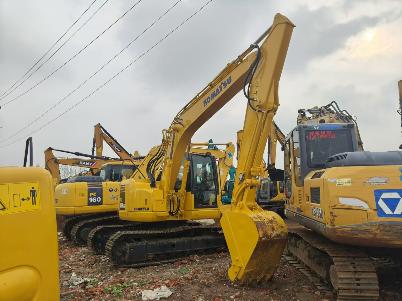 KOMATSU PC138US - Kāpurķēžu ekskavators: foto 1 KOMATSU PC138US - Kāpurķēžu ekskavators: foto 1