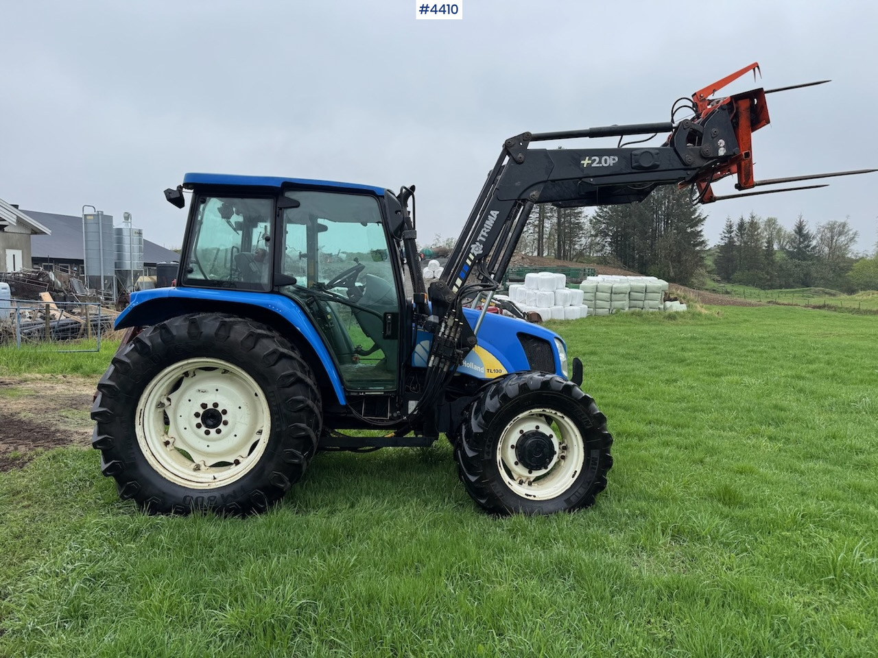 2006 New Holland TL100 A w/Front Loader. - Traktors: foto 3 2006 New Holland TL100 A w/Front Loader. - Traktors: foto 3