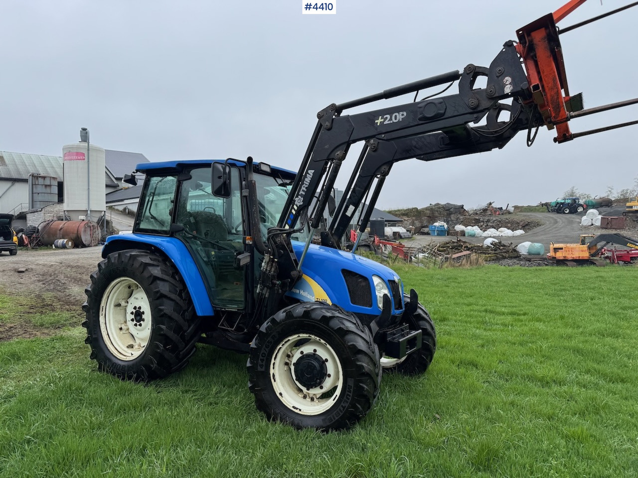 2006 New Holland TL100 A w/Front Loader. - Traktors: foto 2 2006 New Holland TL100 A w/Front Loader. - Traktors: foto 2