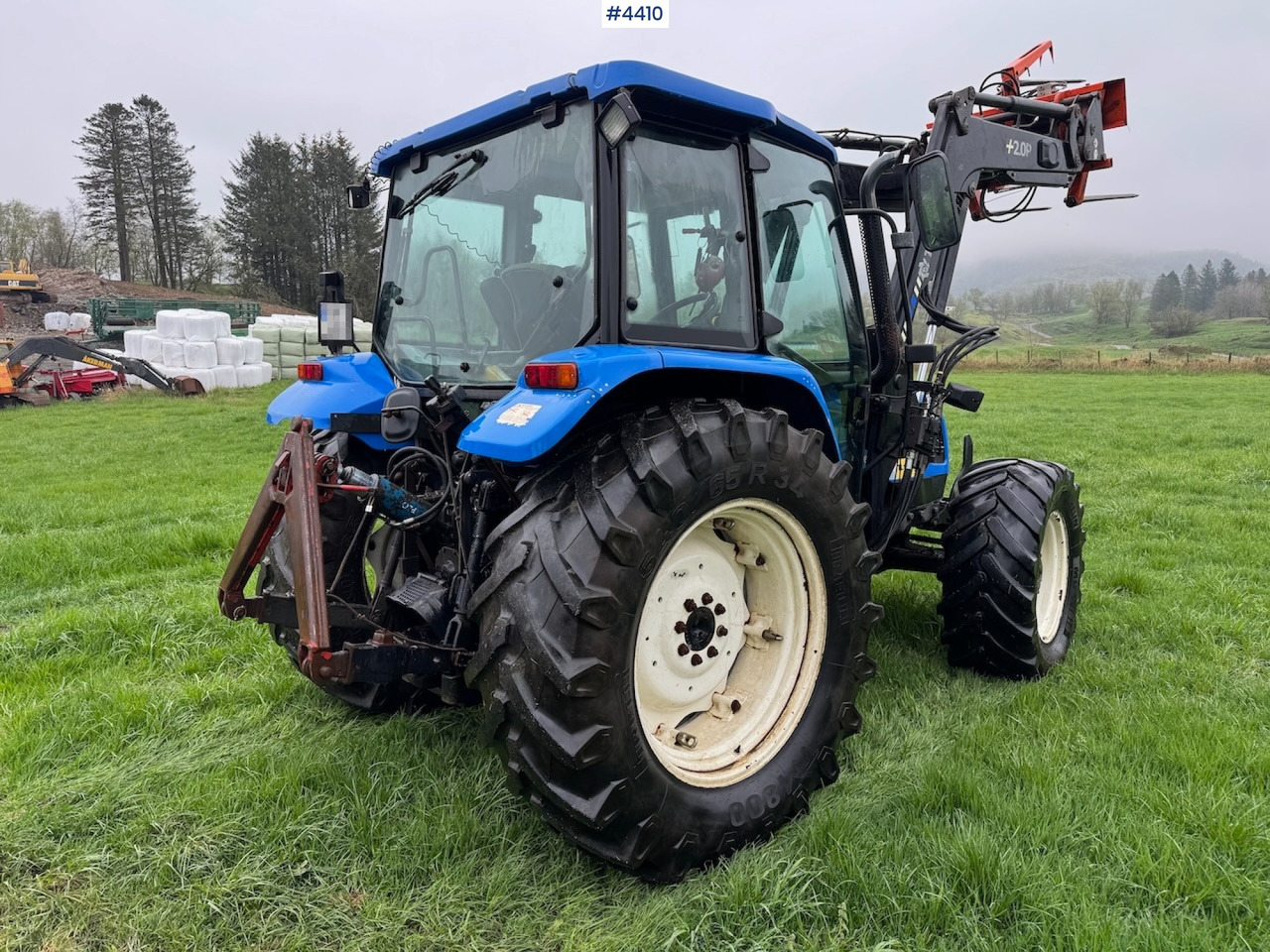 2006 New Holland TL100 A w/Front Loader. - Traktors: foto 5 2006 New Holland TL100 A w/Front Loader. - Traktors: foto 5