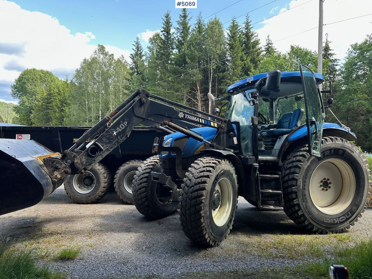 2009 New Holland T6040 SS w/ Trima front loader - Traktors: foto 1 2009 New Holland T6040 SS w/ Trima front loader - Traktors: foto 1