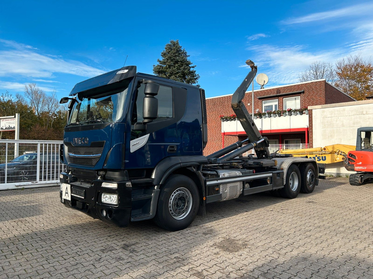 Iveco 460 Stralis MEILLER Abroller mit LIft-Lenkachse - Pacēlājs ar āķi: foto 1 Iveco 460 Stralis MEILLER Abroller mit LIft-Lenkachse - Pacēlājs ar āķi: foto 1