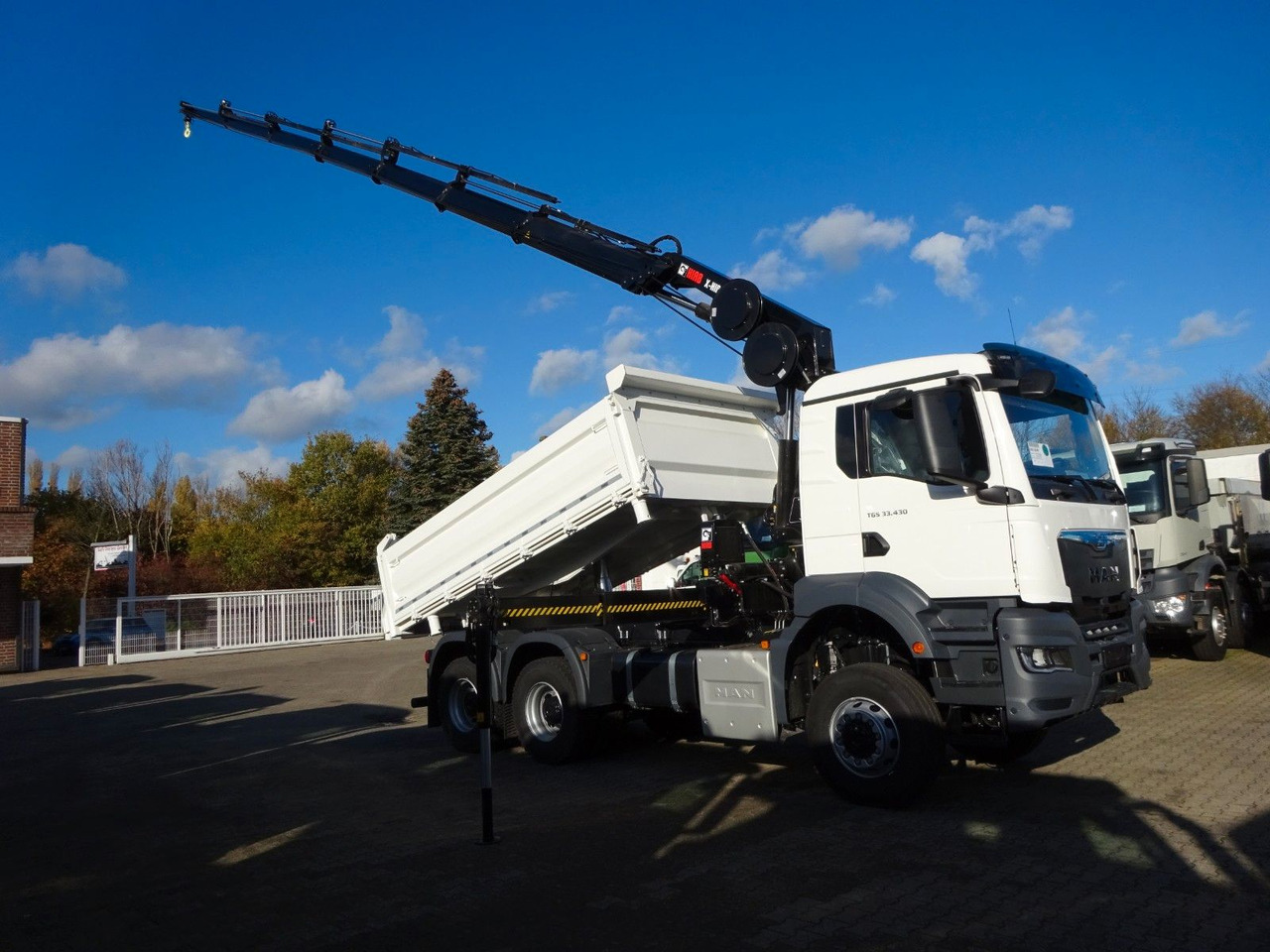 MAN 33.430 6x6 3-SEITENKIPPER KRAN HIAB 228- 6HYDRO - Kravas automašīna pašizgāzējs, Kravas auto ar manipulatoru: foto 1 MAN 33.430 6x6 3-SEITENKIPPER KRAN HIAB 228- 6HYDRO - Kravas automašīna pašizgāzējs, Kravas auto ar manipulatoru: foto 1