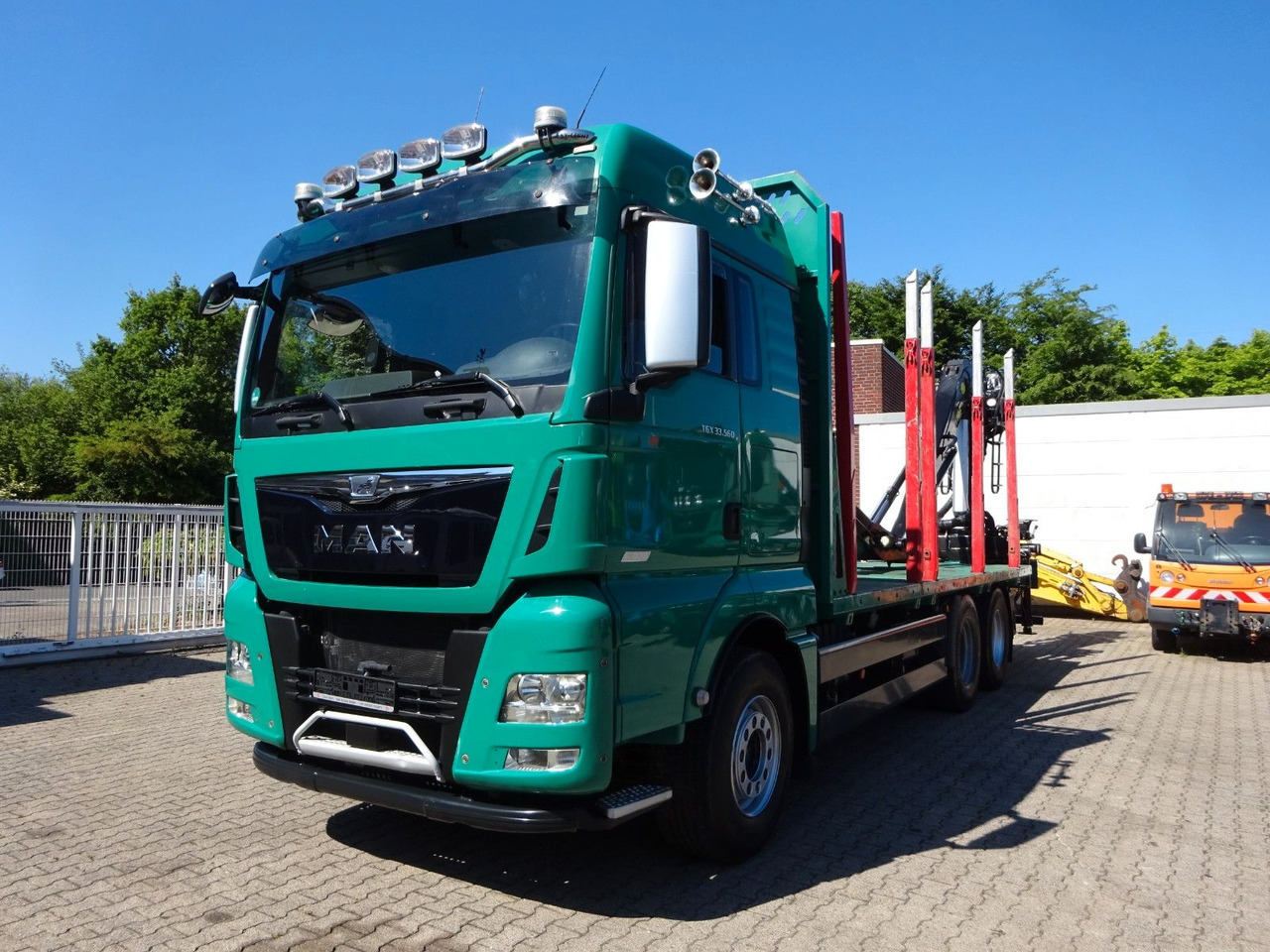 MAN 33.560 TGX mit TAJFUN L150Z Holzladekran 6x4 - Kokvedējs, Kravas auto ar manipulatoru: foto 1 MAN 33.560 TGX mit TAJFUN L150Z Holzladekran 6x4 - Kokvedējs, Kravas auto ar manipulatoru: foto 1