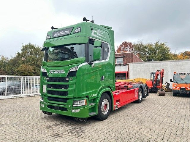 Scania S580 V8 MEILLER Abroller mit Lift+Lenkachse 6x2 - Pacēlājs ar āķi: foto 2 Scania S580 V8 MEILLER Abroller mit Lift+Lenkachse 6x2 - Pacēlājs ar āķi: foto 2