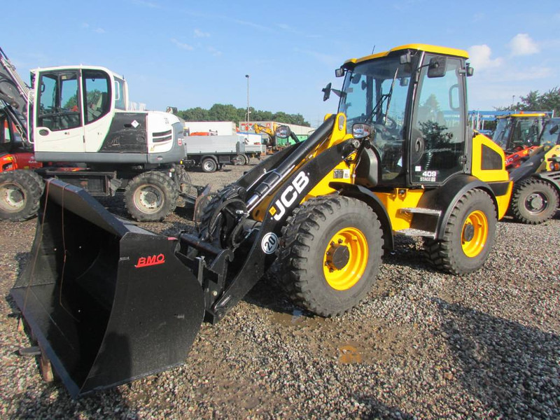 JCB 409 Radlader 46.500 EUR - Riteņu iekrāvējs: foto 2 JCB 409 Radlader 46.500 EUR - Riteņu iekrāvējs: foto 2
