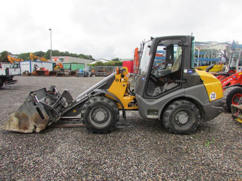 Mecalac AX 700 Radlader 26.000 EUR - Riteņu iekrāvējs: foto 1 Mecalac AX 700 Radlader 26.000 EUR - Riteņu iekrāvējs: foto 1