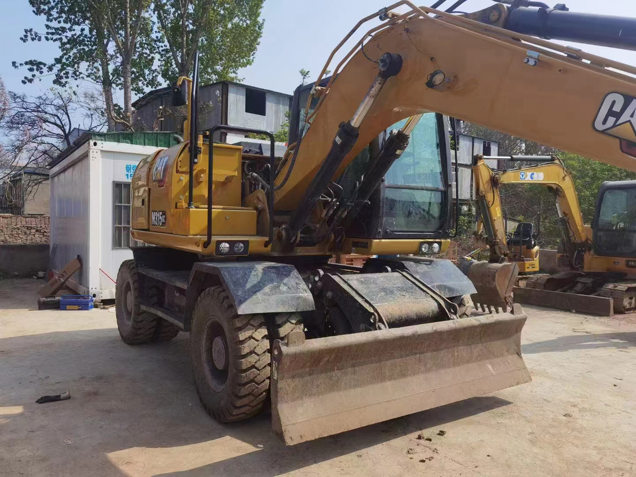 CATERPILLAR M315GC - Riteņu ekskavators: foto 3 CATERPILLAR M315GC - Riteņu ekskavators: foto 3