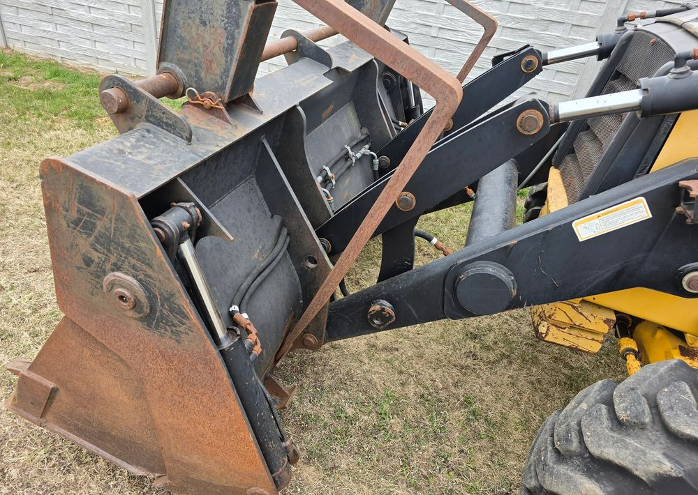 Caterpillar - Ekskavators-iekrāvējs: foto 5 Caterpillar - Ekskavators-iekrāvējs: foto 5