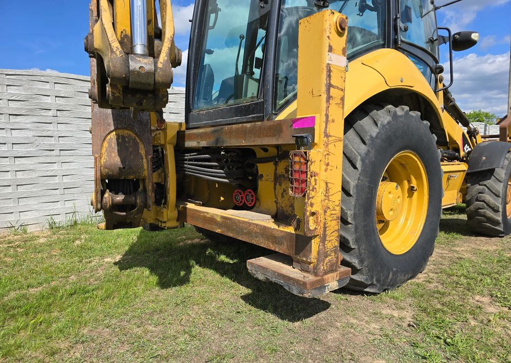 Caterpillar - Ekskavators-iekrāvējs: foto 4 Caterpillar - Ekskavators-iekrāvējs: foto 4