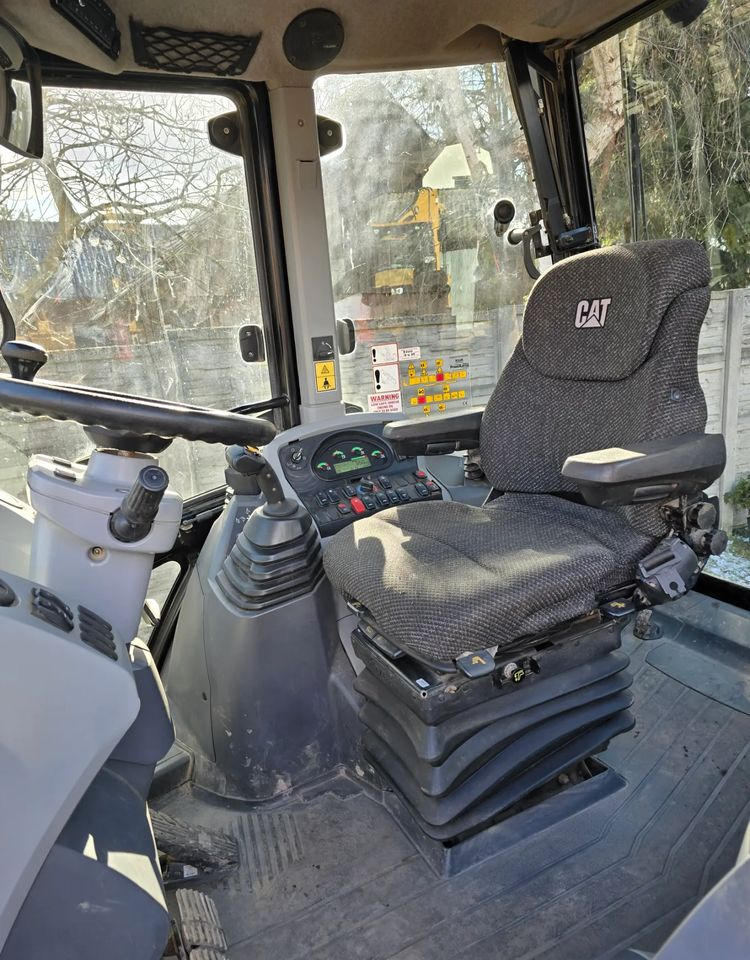 Caterpillar - Ekskavators-iekrāvējs: foto 4 Caterpillar - Ekskavators-iekrāvējs: foto 4