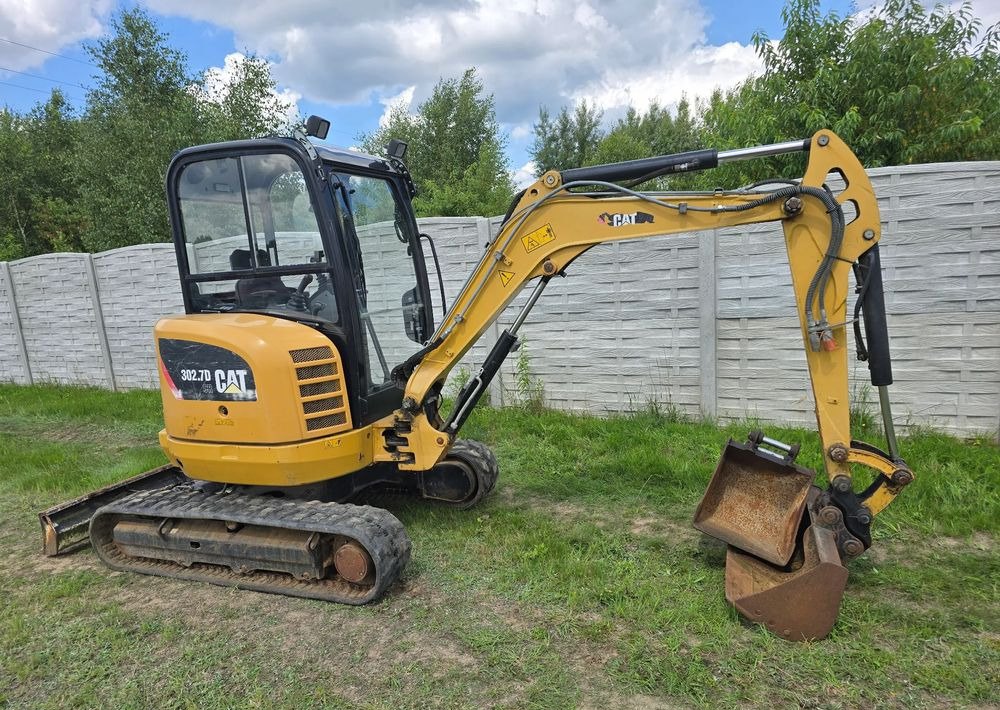 Caterpillar - Mini-ekskavators: foto 1 Caterpillar - Mini-ekskavators: foto 1